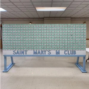A big wooden board featuring the clay reverse raffle.