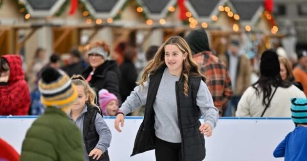 Young girl ice skating at the Dennison Ice Rink.