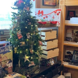 Christmas tree and gift items in a gift shop.