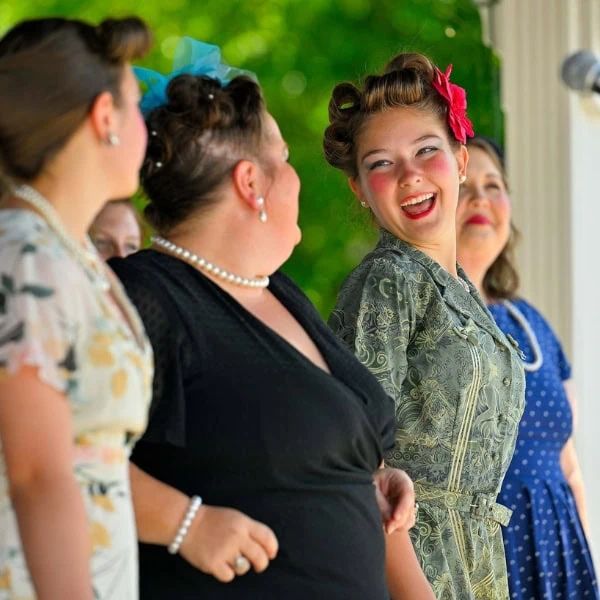 Women dressed in 1940s costumes